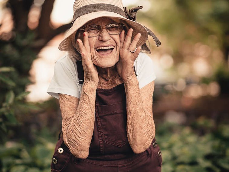 elderly woman laughing