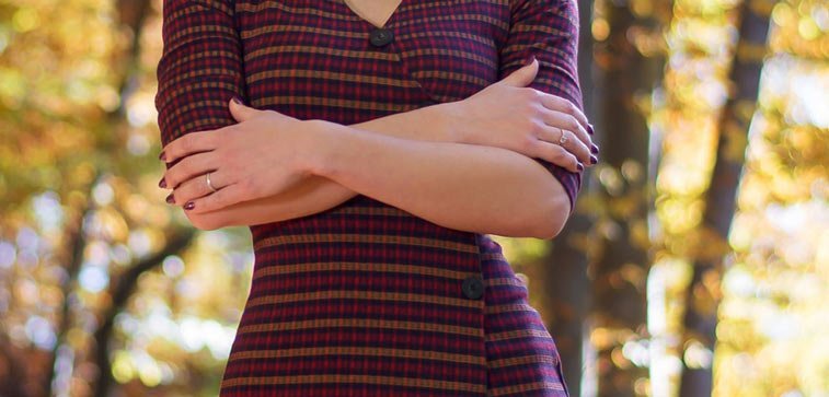 woman holding her stomach