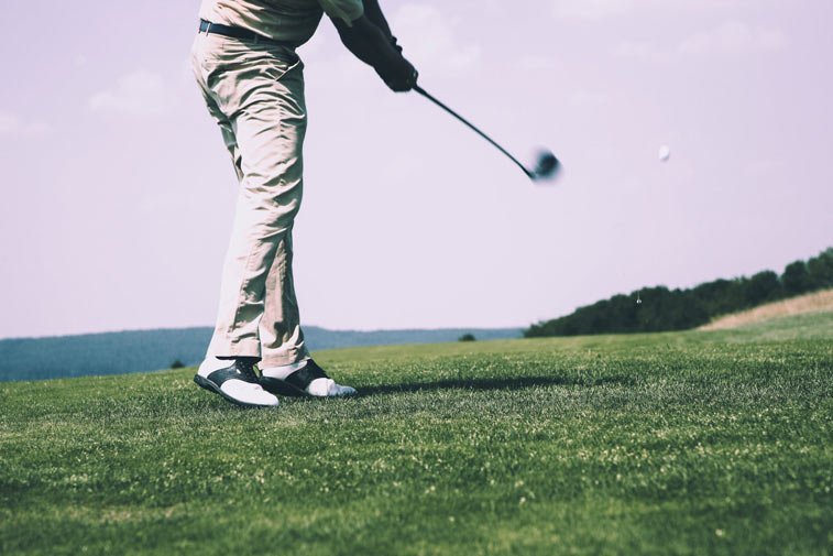 a man golfing