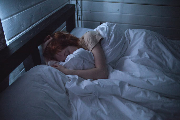 a woman having trouble sleeping