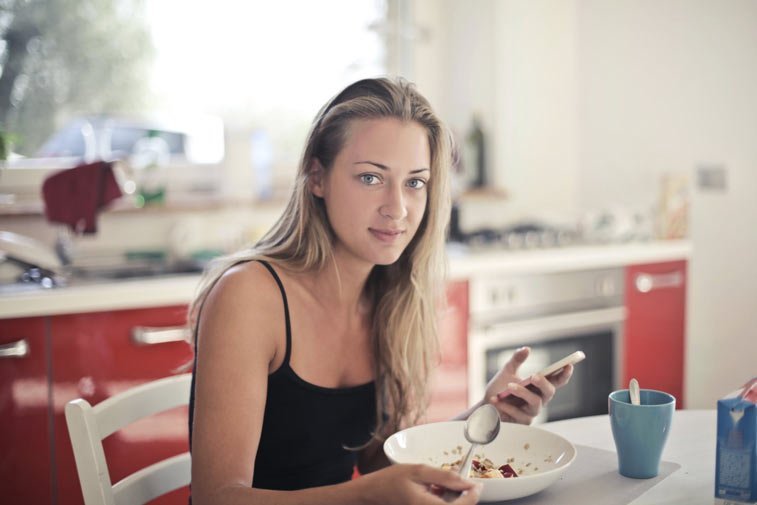 a woman eating oat bran